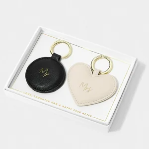 KEYRING SET | Mr AND Mrs | Black/ Eggshell | 6cm x 7cm x 2.5cm - image 1